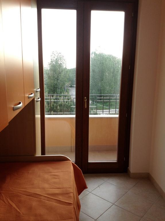 Regina Apartments Alghero Værelse billede