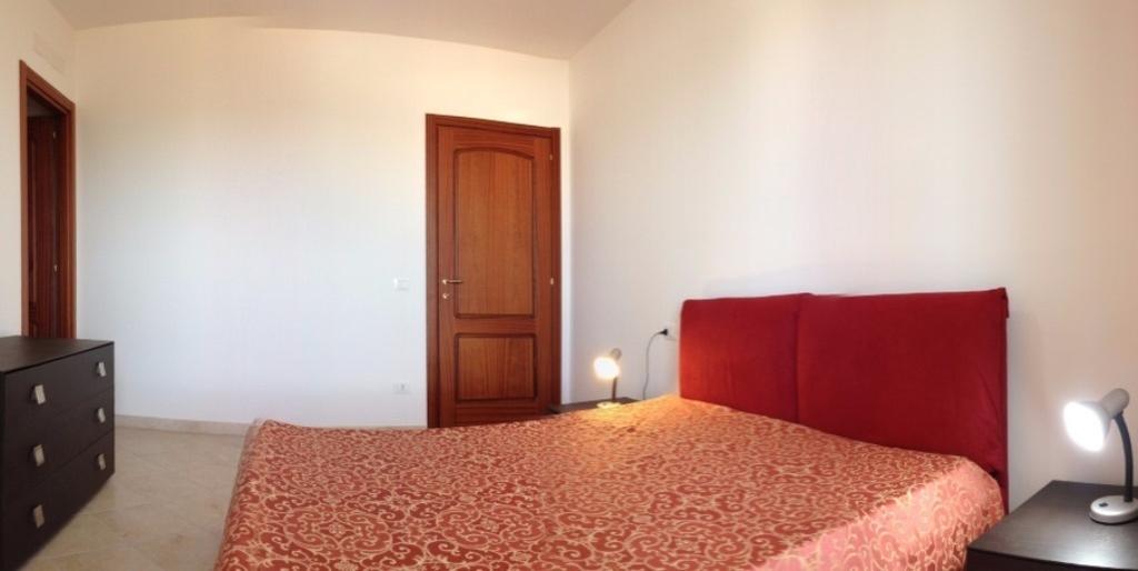Regina Apartments Alghero Værelse billede