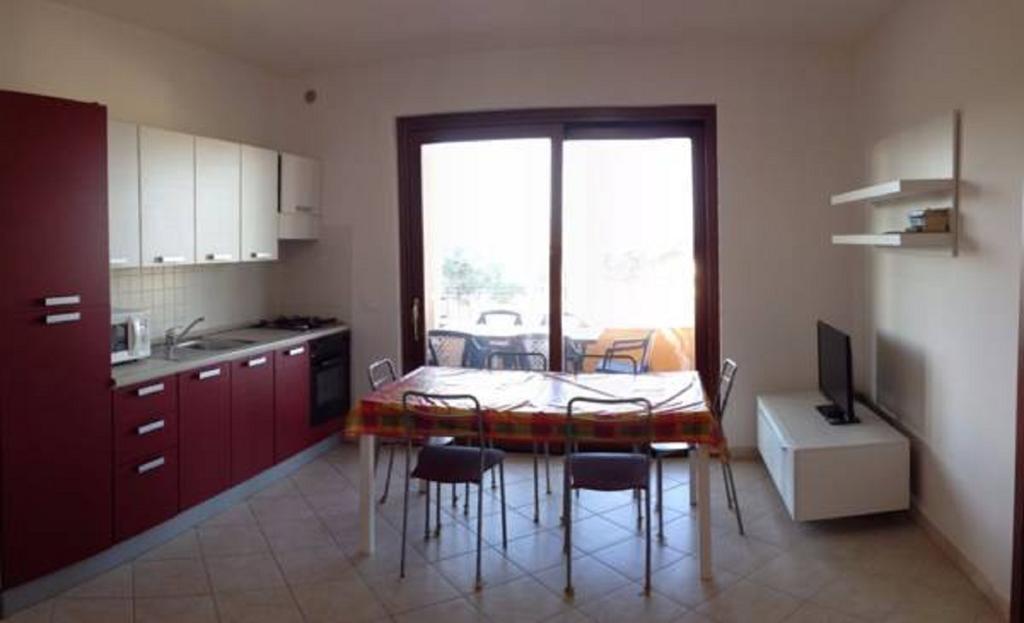Regina Apartments Alghero Værelse billede
