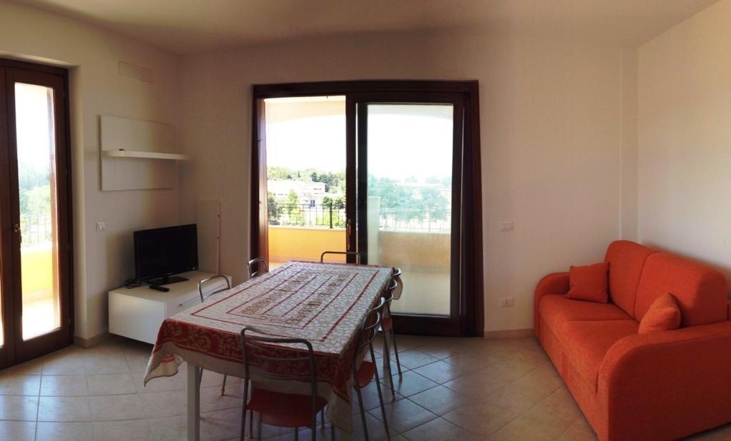 Regina Apartments Alghero Værelse billede