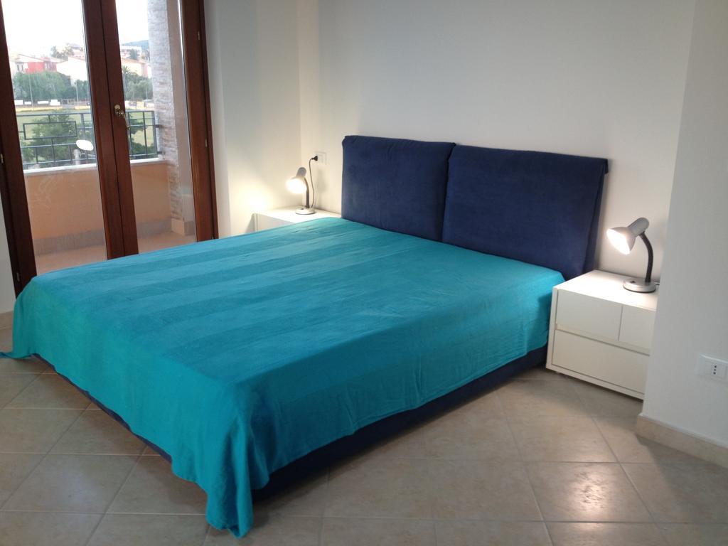 Regina Apartments Alghero Værelse billede