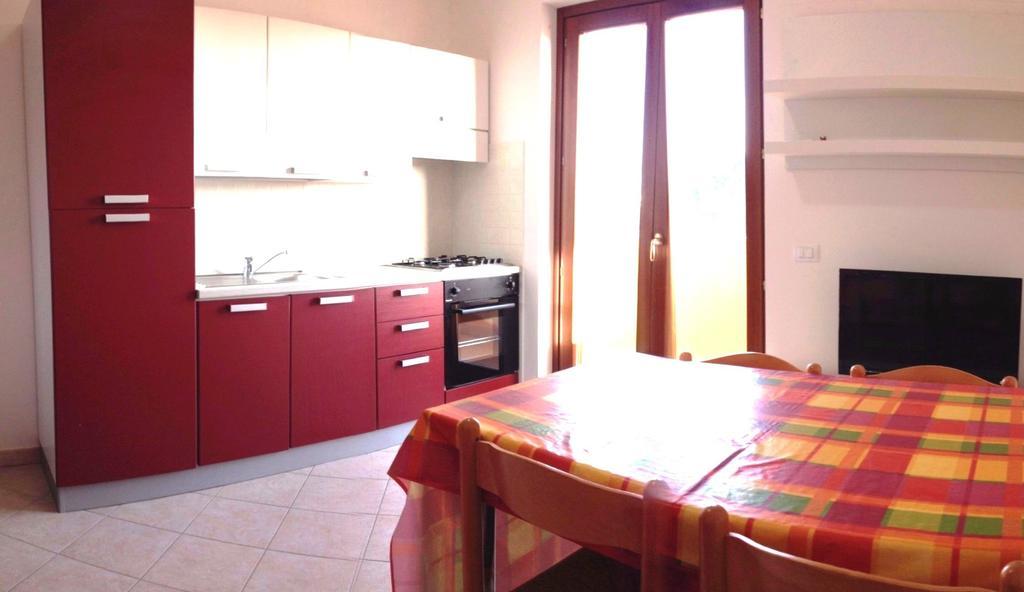 Regina Apartments Alghero Værelse billede