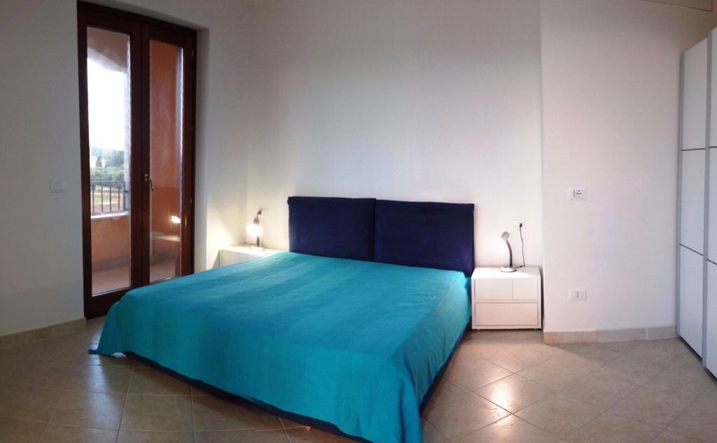 Regina Apartments Alghero Værelse billede