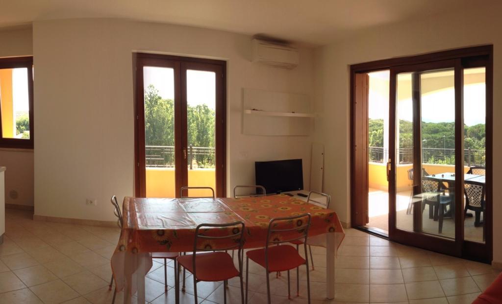 Regina Apartments Alghero Værelse billede