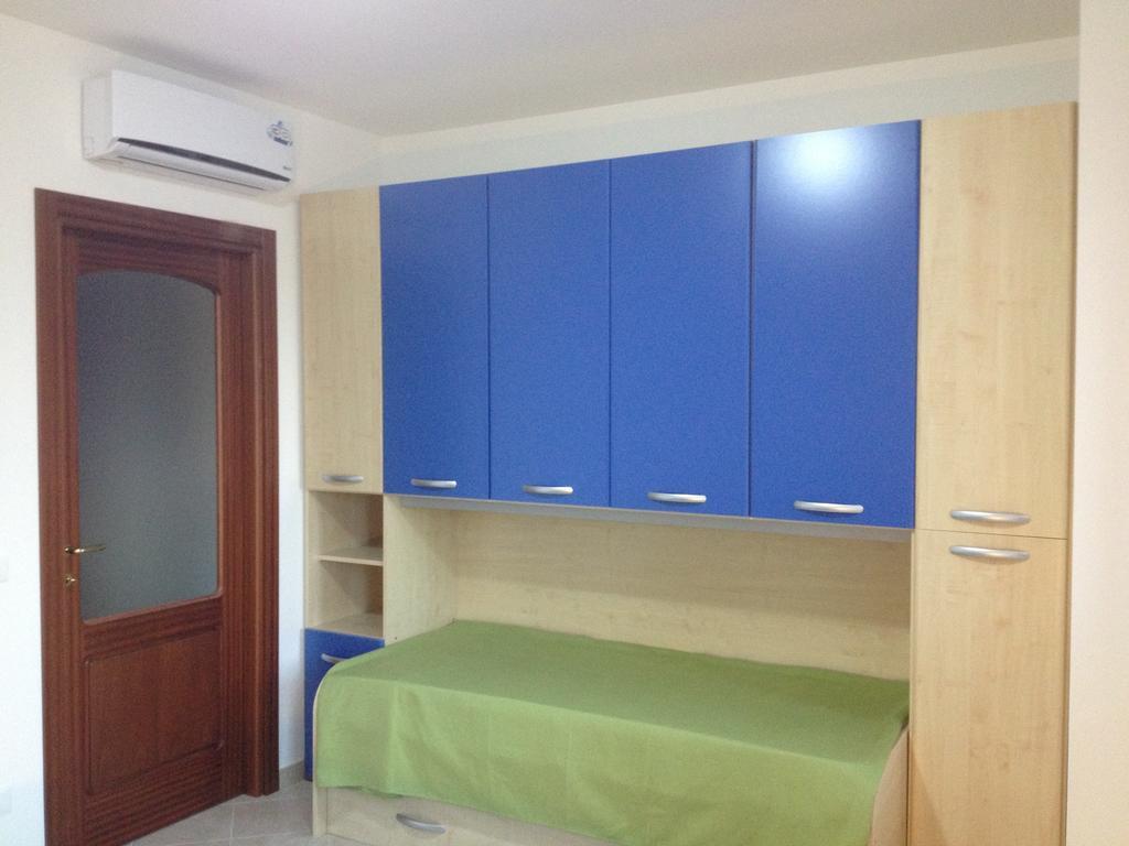 Regina Apartments Alghero Værelse billede