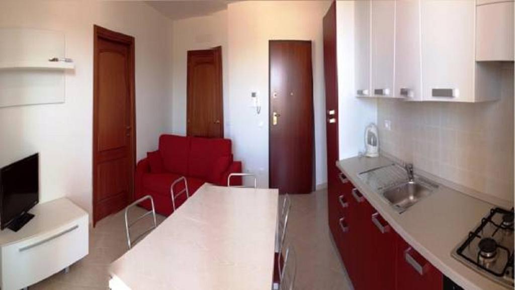 Regina Apartments Alghero Værelse billede