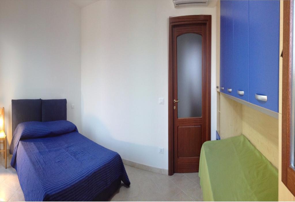Regina Apartments Alghero Værelse billede