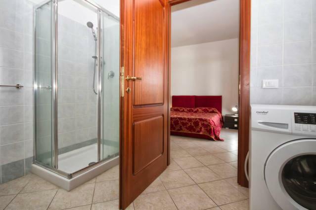 Regina Apartments Alghero Værelse billede